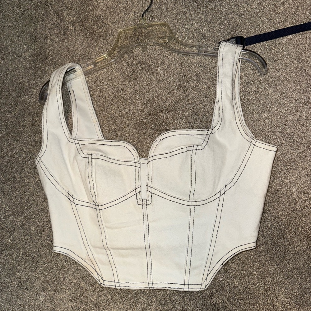 white denim black stitching top. lightly worn.